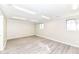 Spacious finished basement with neutral walls, vinyl flooring and recessed lights at 8506 Friendship Ln, Indianapolis, IN 46217