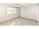 Bright bedroom featuring a ceiling fan and natural light at 8506 Friendship Ln, Indianapolis, IN 46217