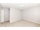 This bedroom includes carpeted floors, neutral walls, and a closet to maximize storage space and functionality at 8506 Friendship Ln, Indianapolis, IN 46217