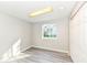 Bedroom featuring a window and light walls at 8506 Friendship Ln, Indianapolis, IN 46217
