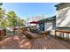 Spacious deck features dining set, umbrella, and built in seating, perfect for enjoying the outdoors at 8506 Friendship Ln, Indianapolis, IN 46217