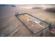 Aerial view highlighting the home, yard, outbuildings, and bordered property lines at 8543 W County Road 600 S, Coatesville, IN 46121