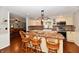Beautiful kitchen featuring custom cabinets, modern appliances, and a stylish breakfast bar with seating at 8543 W County Road 600 S, Coatesville, IN 46121