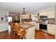 Modern kitchen features stainless steel appliances, a center island and a farmhouse sink at 8543 W County Road 600 S, Coatesville, IN 46121