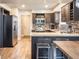 Kitchen featuring stainless steel appliances, granite countertops, and a breakfast bar with seating at 8737 Chateaugay Dr, Indianapolis, IN 46217