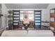 Stylish living room with hardwood floors, slider barn doors, comfortable seating, and elegant decor at 8737 Chateaugay Dr, Indianapolis, IN 46217