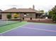 Tennis court and the deck overlooking the yard at 8737 Chateaugay Dr, Indianapolis, IN 46217