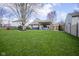 Picture of a spacious backyard with a well-manicured lawn, a hot tub, and a pergola with outdoor furniture, perfect for outdoor living at 10047 Perlita Pl, Fishers, IN 46038
