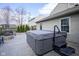 Beautiful backyard area featuring a covered hot tub, with comfortable lounge chairs at 10047 Perlita Pl, Fishers, IN 46038