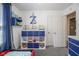 Bright bedroom featuring a modern cube storage unit and decor at 10047 Perlita Pl, Fishers, IN 46038