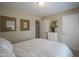 Bedroom featuring a comfortable queen bed, decor, and lots of natural light at 10047 Perlita Pl, Fishers, IN 46038
