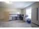 Bedroom with carpet, a built in desk and cabinetry, and large window for plenty of light at 10047 Perlita Pl, Fishers, IN 46038