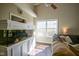 Living room featuring a large built-in aquarium and natural light from a nearby window at 10047 Perlita Pl, Fishers, IN 46038