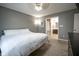 Inviting bedroom with an attached bathroom, neutral walls, and soft carpeting at 10047 Perlita Pl, Fishers, IN 46038
