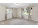 Bright bedroom featuring neutral walls, carpet flooring and dual windows at 10129 Guilford Ave, Carmel, IN 46280