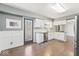 Modern kitchen with white cabinets, stainless steel appliances, and granite countertops at 10129 Guilford Ave, Carmel, IN 46280
