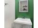 Stylish bathroom with a modern vanity and mirror at 10465 Long Branch Dr, Brownsburg, IN 46112
