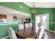 Dining area with a spacious dining table and light entering from the yard area at 10465 Long Branch Dr, Brownsburg, IN 46112