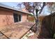Backyard featuring a wood deck, partial fence, sliding glass doors, and an exterior AC unit at 1121 Canterbury Ct, Indianapolis, IN 46260