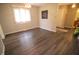 Bright dining area with a large window and modern flooring at 1121 Canterbury Ct, Indianapolis, IN 46260