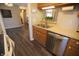 Kitchen with stainless steel dishwasher and ample cabinet space at 1121 Canterbury Ct, Indianapolis, IN 46260