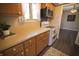Well-lit kitchen featuring updated appliances and ample counter space at 1121 Canterbury Ct, Indianapolis, IN 46260