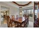 Formal dining room with a stylish chandelier and large window, perfect for entertaining guests at 11249 Tall Trees Dr, Fishers, IN 46038