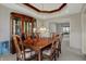 Elegant dining room featuring a traditional-style table and china cabinet, ideal for formal gatherings at 11249 Tall Trees Dr, Fishers, IN 46038