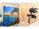 Bathroom showcasing a shower with a tropical beach curtain, a toilet, and palm tree wall decor at 1153 Diablo Rd, Greenwood, IN 46143