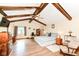 Spacious bedroom featuring beamed ceilings, hardwood floors, and cozy furniture at 1153 Diablo Rd, Greenwood, IN 46143