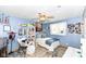 Blue bedroom with ceiling fan, bright decor, seating area, carpet, and natural light at 1153 Diablo Rd, Greenwood, IN 46143
