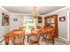 Elegant dining room featuring an antique hutch, hardwood floors, and a chandelier at 1153 Diablo Rd, Greenwood, IN 46143