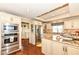 Well-lit kitchen featuring stainless steel appliances, granite countertops, and a breakfast bar at 1153 Diablo Rd, Greenwood, IN 46143