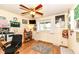 Office space featuring bright decor, hardwood floors, large windows, and desk area at 1153 Diablo Rd, Greenwood, IN 46143