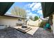 Charming stone patio with a built-in fire pit, perfect for outdoor entertaining at 1153 Diablo Rd, Greenwood, IN 46143