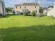A spacious backyard provides plenty of room to play and entertain with an exterior deck at 12332 Cobblefield Ct, Fishers, IN 46037