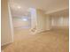 Spacious unfinished basement with neutral carpet and stairway at 12332 Cobblefield Ct, Fishers, IN 46037