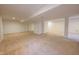 Spacious finished basement with neutral carpeting, doors, and recessed lighting at 12332 Cobblefield Ct, Fishers, IN 46037