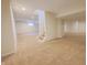Spacious finished basement with neutral carpeting and access to the upper level, perfect for entertaining at 12332 Cobblefield Ct, Fishers, IN 46037