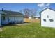 Spacious backyard with a patio set and a fenced yard at 126 Windemere Rd, Whiteland, IN 46184