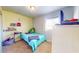 bedroom featuring a twin bed, a window, and a closet at 126 Windemere Rd, Whiteland, IN 46184