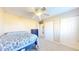 Neutral bedroom features a ceiling fan, closet, and a dresser at 126 Windemere Rd, Whiteland, IN 46184