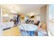 Bright kitchen, dining and living area with white cabinets and stainless steel appliances at 126 Windemere Rd, Whiteland, IN 46184