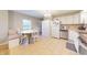 Bright kitchen with white cabinets and stainless steel appliances at 126 Windemere Rd, Whiteland, IN 46184