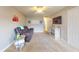 Inviting living room with neutral tones, plush carpet, and a comfortable sofa at 126 Windemere Rd, Whiteland, IN 46184