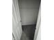 A walk-in closet with gray carpeting awaits organizational touches and storage solutions at 1272 Southlake E Ave, Greenwood, IN 46143