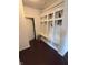 Hallway mudroom features built-in storage and coat racks for organization near the home's entryway at 1272 Southlake E Ave, Greenwood, IN 46143
