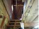 Interior attic view featuring unfinished wooden stairway and exposed insulation at 13065 Allman Dr, Mooresville, IN 46158