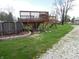 Large backyard featuring a wooden deck and above ground pool, ideal for entertainment and outdoor activities at 13065 Allman Dr, Mooresville, IN 46158
