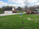 Spacious backyard featuring a large barn with garage, a playground and pool providing ample outdoor space at 13065 Allman Dr, Mooresville, IN 46158